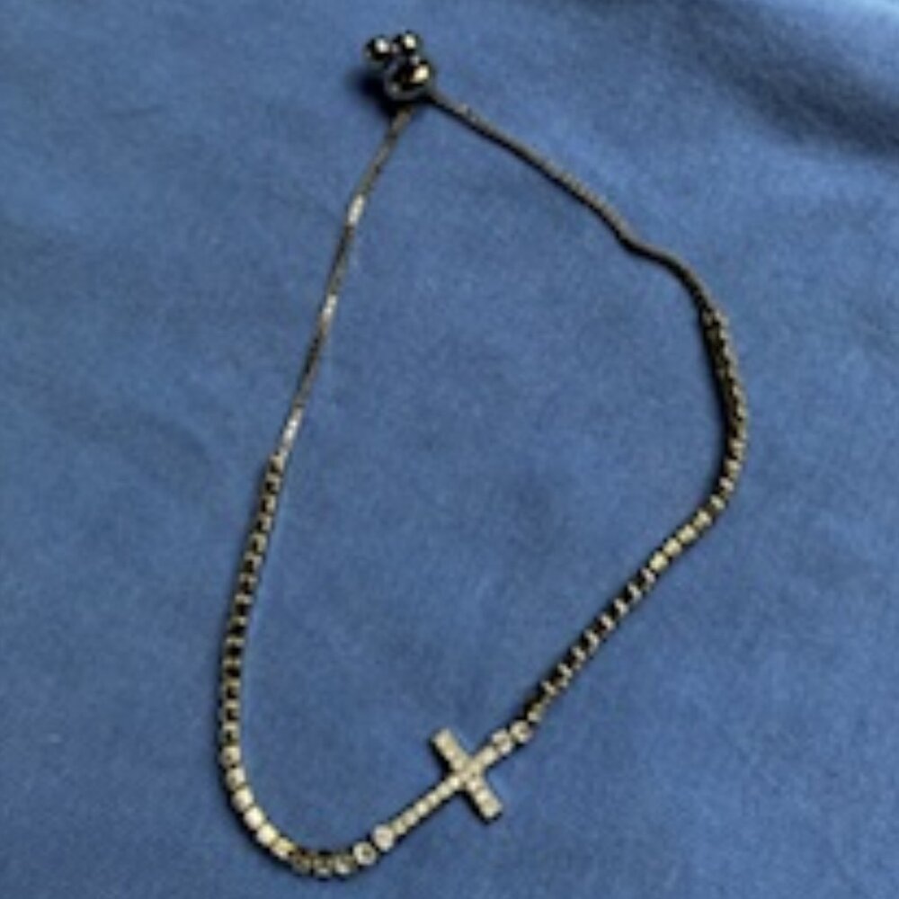 Silver Crucifix bracelet, delicate chain with silver knot to tighten, one size